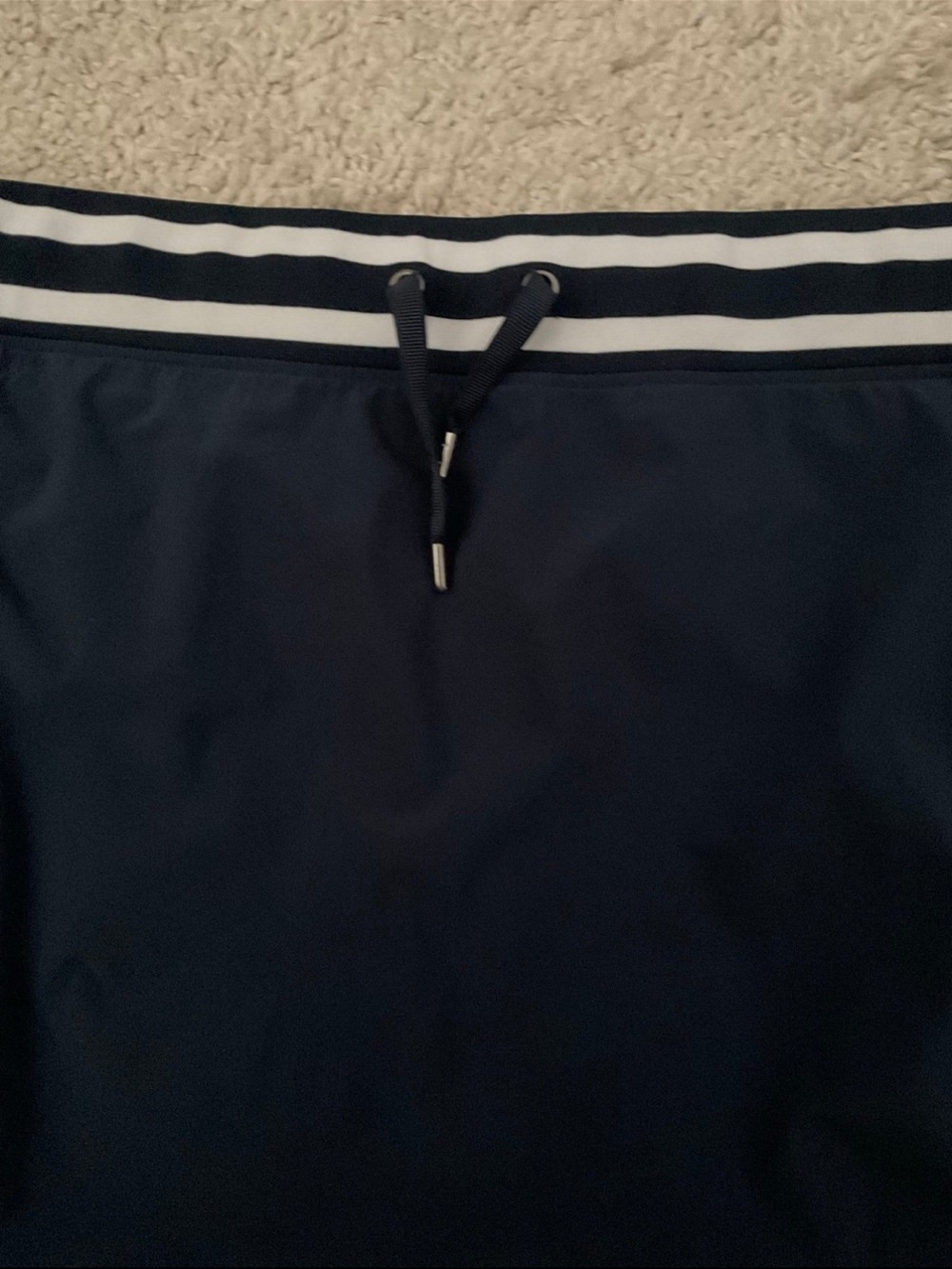 Athleta Dark Blue Skort with White Waist Stripe